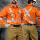 worker wearing Ultrasoft Hi Vis FR Deluxe Segmented Orange Striped Work Shirt